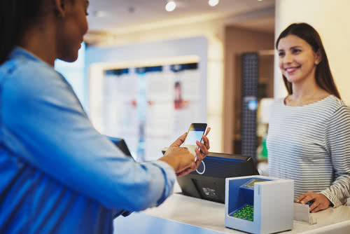 A small business owner offers financing to customers, allowing her to make a sale