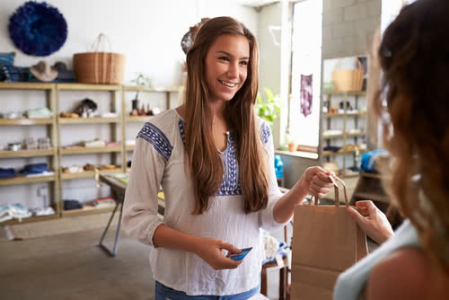 Customer attends boutique event, a marketing idea for small businesses