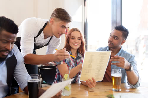 Cafe owner follows tips for restaurant owners by chatting with customers