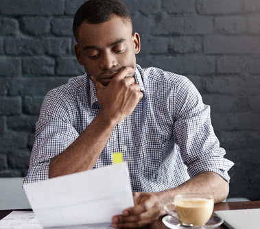 A business owner considers whether they should use a business investor or loan